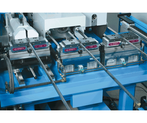 3 hydraulically-operated concentric vises "HILMA.ZH 100" on a machine for machining of ends 3 hydraulically-operated concentric vises "HILMA.ZH 100" on a machine for machining of ends